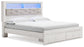 Altyra Queen Upholstered Bookcase Bed with Storage