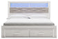 Altyra Queen Upholstered Bookcase Bed with Storage